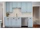 Updated kitchen featuring elegant countertops, stainless steel appliances, and soft-close cabinets at 6655 S Elm Cir, Centennial, CO 80121
