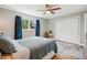 Serene main bedroom boasts hardwood floors, a window view, and ample closet space at 6655 S Elm Cir, Centennial, CO 80121