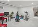 Basement featuring home gym with carpet flooring and space for exercise and office equipment at 1594 S Locust St, Denver, CO 80224