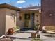 Inviting front porch with seating area and decorative metalwork at 1594 S Locust St, Denver, CO 80224