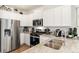 Modern kitchen with stainless steel appliances and granite countertops at 22293 E 6Th Pl, Aurora, CO 80018