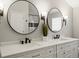 Elegant bathroom featuring double vanity sinks, quartz countertops, and modern fixtures at 345 Fillmore St # 407, Denver, CO 80206