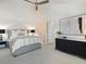 Spacious bedroom features neutral colors, plush carpeting, ceiling fan, and contemporary decor at 345 Fillmore St # 407, Denver, CO 80206