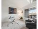 Bright home office featuring a large window, modern desk, and stylish decor for a productive work environment at 345 Fillmore St # 407, Denver, CO 80206