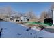 Fenced backyard with storage shed and patio at 939 Knox Ct, Denver, CO 80204