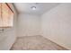 Small bedroom with window and neutral walls at 939 Knox Ct, Denver, CO 80204