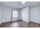 Bright bedroom with wood floors and a large closet at 939 Knox Ct, Denver, CO 80204