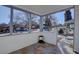 Covered porch with tile flooring, offering street views at 939 Knox Ct, Denver, CO 80204