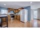 Galley kitchen with stainless steel appliances at 939 Knox Ct, Denver, CO 80204