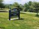 Image of Paco Sanchez park sign, green with white lettering at 939 Knox Ct, Denver, CO 80204