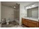 Bathroom featuring a vanity with a sink and tub with shower at 804 Summer Hawk Dr # 5105, Longmont, CO 80504