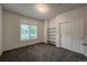 Cozy bedroom with neutral walls, carpet and window with shutters at 804 Summer Hawk Dr # 5105, Longmont, CO 80504