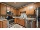 Cozy kitchen features stainless steel appliances and ample counter space at 804 Summer Hawk Dr # 5105, Longmont, CO 80504