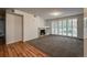 Spacious living room features plush carpet, fireplace, and shutters at 804 Summer Hawk Dr # 5105, Longmont, CO 80504