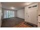 Bright living room with fireplace, shutters, and wood flooring at the entry at 804 Summer Hawk Dr # 5105, Longmont, CO 80504