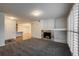 Open living space leads to the dining and kitchen area with fireplace and abundant light at 804 Summer Hawk Dr # 5105, Longmont, CO 80504