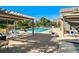 Beautiful pool area featuring lounge chairs and a pergola, with landscaping at 804 Summer Hawk Dr # 5105, Longmont, CO 80504
