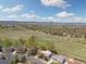 Expansive aerial view of the neighborhood, landscape, and the mountains in the distance at 1309 Alexandria St, Lafayette, CO 80026