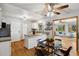 The kitchen is bright and open with granite countertops and access to a cozy living room at 1309 Alexandria St, Lafayette, CO 80026
