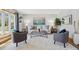 Bright and airy living room features a cozy seating arrangement and stylish decor at 1309 Alexandria St, Lafayette, CO 80026