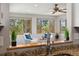Sunny living area with window views and a cozy seating arrangement at 1309 Alexandria St, Lafayette, CO 80026