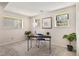 Well-lit home office with a desk and windows at 1309 Alexandria St, Lafayette, CO 80026