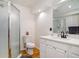 Bright bathroom featuring a shower, toilet, vanity with modern fixtures, and tile floors at 16084 Stonebriar Dr, Parker, CO 80134