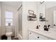 Modern bathroom features a sink with black fixtures, ample storage and a shower-tub combination at 16084 Stonebriar Dr, Parker, CO 80134