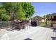 Entertain on the spacious deck with outdoor dining set and built-in grill at 16084 Stonebriar Dr, Parker, CO 80134
