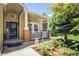 Inviting front porch with a cozy seating area, perfect for enjoying the outdoors and curb appeal at 16084 Stonebriar Dr, Parker, CO 80134