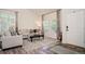 Bright living room features vaulted ceilings, neutral decor, and a welcoming atmosphere at 16084 Stonebriar Dr, Parker, CO 80134