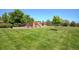 Community playground with swings, slides, and climbing structures at 16084 Stonebriar Dr, Parker, CO 80134