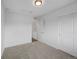 Neutral bedroom with closet and a view from the window at 5292 Columbine Ln, Denver, CO 80221