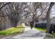 Scenic bike path winding through a tree-lined neighborhood on a sunny day at 5292 Columbine Ln, Denver, CO 80221
