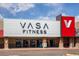 Exterior of VASA Fitness center with a modern design and clear signage on a sunny day at 5292 Columbine Ln, Denver, CO 80221