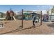 Fun playground with swings, playhouse, and slides with children to enjoy on a sunny day at 5292 Columbine Ln, Denver, CO 80221