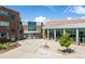 Westminster High School featuring a red brick facade, modern architecture, and a well-maintained entrance at 5292 Columbine Ln, Denver, CO 80221