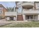 Beautifully landscaped backyard with multiple patios, stairs, and inviting outdoor living spaces at 2035 Buchanan Pt, Lafayette, CO 80026