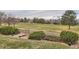 Beautifully landscaped backyard featuring a green lawn and privacy at 2035 Buchanan Pt, Lafayette, CO 80026