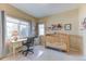 Cozy Bedroom or bedroom with a crib, desk, and soft natural light streaming through the window at 2035 Buchanan Pt, Lafayette, CO 80026