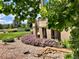 Exterior image of the property showcasing landscaped gardens and attractive design at 2035 Buchanan Pt, Lafayette, CO 80026
