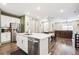 Spacious kitchen island seamlessly connecting living and dining spaces at 765 N Shawnee St, Aurora, CO 80018