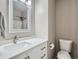 Bright bathroom with a white vanity and a brushed nickel faucet at 13358 Briarwood Dr, Broomfield, CO 80020