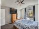 Bright bedroom featuring natural light and a ceiling fan at 13358 Briarwood Dr, Broomfield, CO 80020