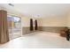 Finished basement area with sliding glass doors at 2888 S Fundy St, Aurora, CO 80013