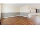 Spacious living room featuring hardwood floors and neutral-toned walls at 2888 S Fundy St, Aurora, CO 80013