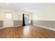 Bright, airy living room with hardwood floors and a large window at 2888 S Fundy St, Aurora, CO 80013