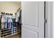 Walk-in closet, featuring ample shelving and hanging space for clothes and shoes at 8617 Gold Peak Dr # D, Highlands Ranch, CO 80130