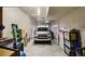 Garage featuring ample space and a car at 8617 Gold Peak Dr # D, Highlands Ranch, CO 80130