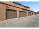 Attached garage with multiple bays and wood detailing, offering ample parking and storage space at 8617 Gold Peak Dr # D, Highlands Ranch, CO 80130